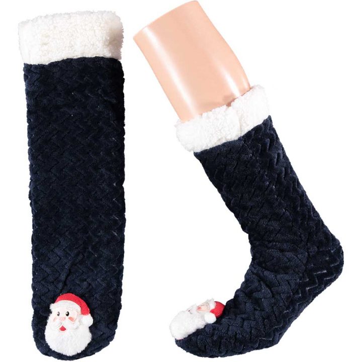 Aikuisten pehmeät sukat, joissa kärjessä jouluinen hahmo. Koko: One size. Malli: Joulupukki.