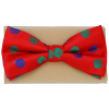 Red Christmas bow tie with christmas ornaments.