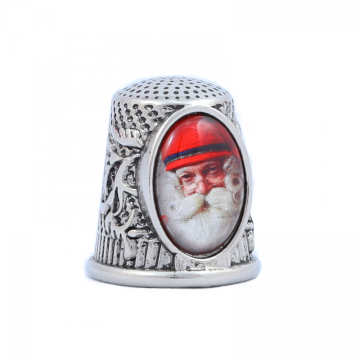 Thimble with Santa Claus picture.